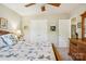 Well-lit bedroom with closet, ceiling fan, and neutral walls at 10716 Persimmon Creek Dr, Mint Hill, NC 28227