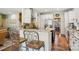 Gourmet kitchen featuring granite counters, stainless appliances and an island with bar seating at 10716 Persimmon Creek Dr, Mint Hill, NC 28227