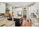 Well-equipped kitchen showcasing stainless steel appliances, granite countertops, and a center island with storage at 10716 Persimmon Creek Dr, Mint Hill, NC 28227