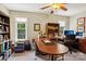 Functional office space with natural light, ample storage, and workspace at 10716 Persimmon Creek Dr, Mint Hill, NC 28227