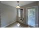 Cozy breakfast nook with tile flooring and a door to the outside at 119 N Laurel Ave # 1, Charlotte, NC 28207