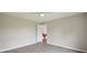 This bedroom offers neutral walls, modern gray flooring, and a ceiling fan at 125 Rocky Pt, Cleveland, NC 27013