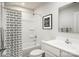 Clean bathroom featuring a shower-tub combo with patterned shower curtain, white vanity, and neutral decor at 128 Millstream Dr, China Grove, NC 28023