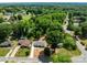 Captured from above, a home nestled in a serene, green-filled residential area is displayed at 1306 Klondale Ave, Kannapolis, NC 28081