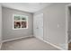 Bright bedroom featuring neutral paint, and natural light through a large window at 1306 Klondale Ave, Kannapolis, NC 28081