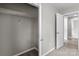 View into an empty closet with a wire shelf for tidy storage at 1306 Klondale Ave, Kannapolis, NC 28081