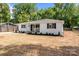 Charming single-story home with a well-manicured front yard and inviting covered porch, perfect for relaxing at 1306 Klondale Ave, Kannapolis, NC 28081