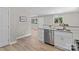 Beautiful kitchen with bar seating and stainless steel appliances that connects to the open concept floor plan at 1306 Klondale Ave, Kannapolis, NC 28081