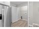Conveniently located laundry room off of kitchen with light wood-look flooring at 1306 Klondale Ave, Kannapolis, NC 28081
