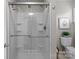 A modern glass shower showcasing clean lines in a renovated bathroom at 1306 Klondale Ave, Kannapolis, NC 28081