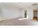 Large bedroom with carpet, open doors to bathroom with glass shower and walk-in closet at 1436 Ardmore Dr # 342, Sherrills Ford, NC 28673