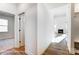 Bright hallway leading to an open living area with a fireplace and large windows for natural light at 1436 Ardmore Dr # 342, Sherrills Ford, NC 28673