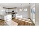 Open-concept kitchen featuring an island, stainless steel appliances, and bright eating area at 1436 Ardmore Dr # 342, Sherrills Ford, NC 28673