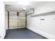 Organized garage with rubber flooring, pegboard walls, and ample storage potential at 1455 Fieldcrest Cir, Rock Hill, SC 29732