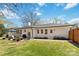 Expansive backyard featuring a patio with outdoor seating and a well-maintained lawn, great for outdoor relaxation and entertainment at 1467 Alexander Rd, Rock Hill, SC 29732