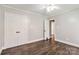 Well-lit bedroom featuring a double door closet and an open doorway at 1467 Alexander Rd, Rock Hill, SC 29732