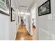 Hallway view with hardwood floors that leads to a bedroom and a bathroom with white paint at 1467 Alexander Rd, Rock Hill, SC 29732