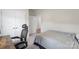 Carpeted bedroom featuring neutral paint and a view to the interior hallway at 167 White Apple Way, Statesville, NC 28625
