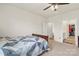 Comfortable bedroom with carpeting, a large window, and a quilted bedspread for a cozy feel at 167 White Apple Way, Statesville, NC 28625