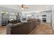 Open concept living room with hardwood floors and a view of the kitchen at 167 White Apple Way, Statesville, NC 28625