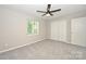 Bedroom with ceiling fan and standard closet at 1931 Mereview Ct # 46, Charlotte, NC 28210