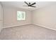 Spacious bedroom with ceiling fan and natural light at 1931 Mereview Ct # 46, Charlotte, NC 28210