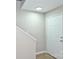 Bright entryway with white door, recessed lighting, and modern flooring at 1931 Mereview Ct # 46, Charlotte, NC 28210