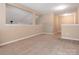Large and unfinished basement space with a carpet and electrical outlets at 208 Fielding St, Mount Holly, NC 28120