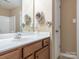 Bathroom vanity with a mirror, cabinet, and modern fixtures at 208 Fielding St, Mount Holly, NC 28120