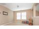 Neutral bedroom filled with natural light coming from the two bright, shuttered windows at 208 Fielding St, Mount Holly, NC 28120