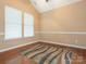 Bedroom showcasing wood floors, a vaulted ceiling, and a bright window for natural light at 208 Fielding St, Mount Holly, NC 28120