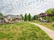 Community pool area with playground, picnic shelter, and lush landscaping for neighborhood enjoyment at 208 Fielding St, Mount Holly, NC 28120
