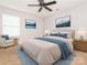 Decorated bedroom with a comfortable bed, side chair, and stylish accents at 208 Fielding St, Mount Holly, NC 28120