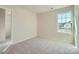 Bedroom featuring carpet, a window providing natural light, and closet at 2107 Columbidae Ln, Gastonia, NC 28052