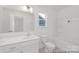 Well-lit bathroom with dual vanity and tub/shower combo at 2309 Bulwarks Ct # 4P, Albemarle, NC 28001