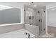 Luxurious bathroom with a tiled glass enclosed shower and soaking tub at 2309 Bulwarks Ct # 4P, Albemarle, NC 28001