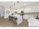 Bright and airy kitchen featuring a large center island, pendant lighting, and stainless steel appliances at 2309 Bulwarks Ct # 4P, Albemarle, NC 28001