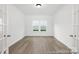 Bright office space with modern floors, abundant natural light, and double glass doors at 2309 Bulwarks Ct # 4P, Albemarle, NC 28001