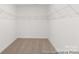 Spacious walk-in closet with ample shelving at 2309 Bulwarks Ct # 4P, Albemarle, NC 28001