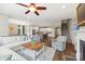Open concept living room with a view of the dining room, kitchen, and staircase at 2322 Morrison Rd, York, SC 29745