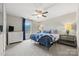 Bright bedroom features a comfortable bed, soft carpet, and a dresser by the window at 2322 Morrison Rd, York, SC 29745