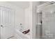 Modern bathroom features a separate tub and shower with glass door at 2739 Golden Rose Ln, Charlotte, NC 28216