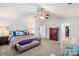 Cozy bedroom features bedside table and walk-in closet at 2739 Golden Rose Ln, Charlotte, NC 28216