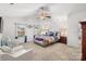 Spacious bedroom features high ceilings, large windows, and ceiling fan at 2739 Golden Rose Ln, Charlotte, NC 28216