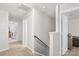 Upstairs hallway leads to the laundry room and bedrooms at 2739 Golden Rose Ln, Charlotte, NC 28216