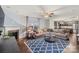 Spacious living room featuring a fireplace, hardwood floors, and an open layout at 2739 Golden Rose Ln, Charlotte, NC 28216