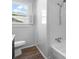 A clean, newly renovated bathroom with a shower-tub combination and modern fixtures at 3015 North Center Nw St, Hickory, NC 28601