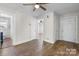 The large main bedroom has hardwood floors, a ceiling fan, and good closet space at 3015 North Center Nw St, Hickory, NC 28601