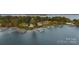 Expansive waterfront homes featuring private docks and boat slips along the serene shoreline at 356 Yacht Rd, Mooresville, NC 28117