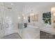 Beautiful bathroom featuring a glass enclosed shower, elegant soaking tub, and dual vanity sinks at 356 Yacht Rd, Mooresville, NC 28117